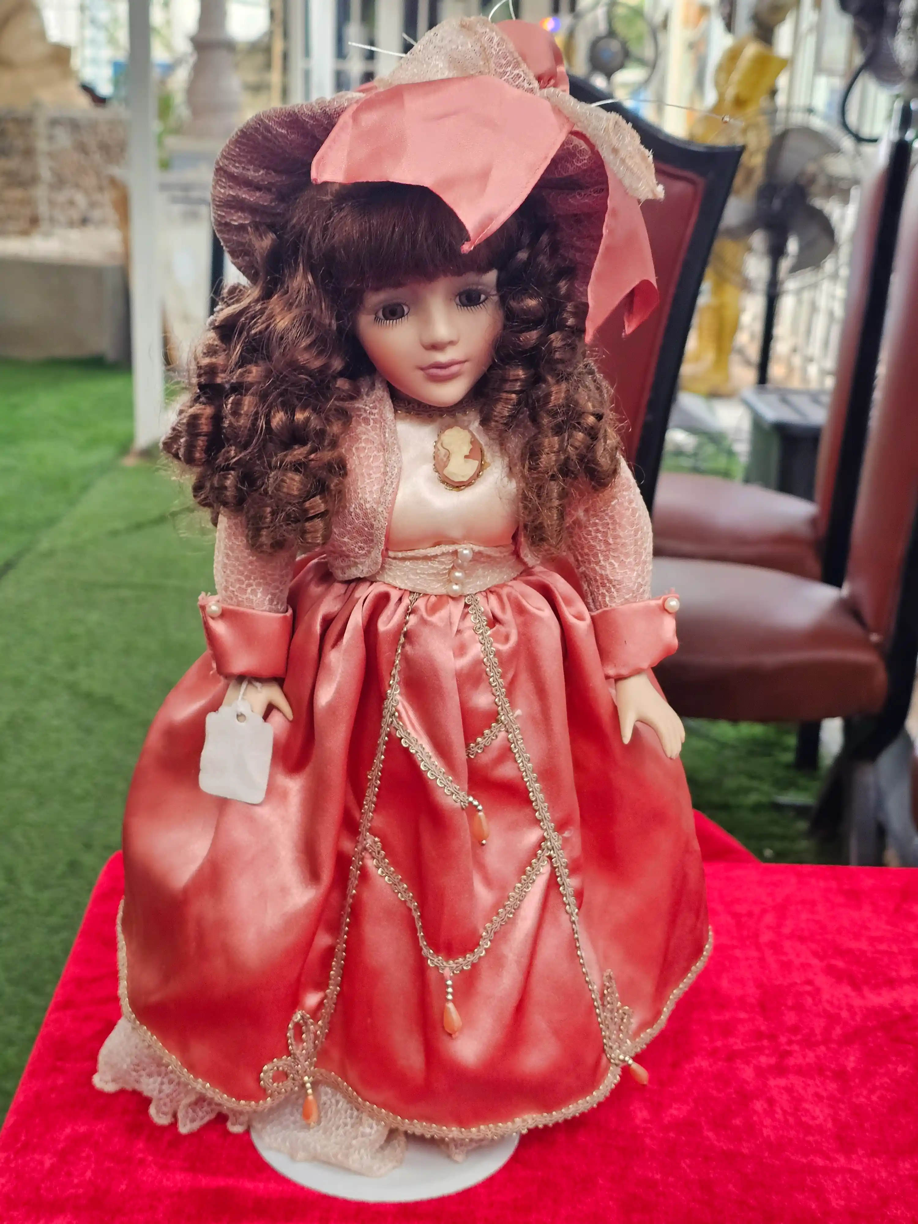 Porcelain Doll in Rose Gown