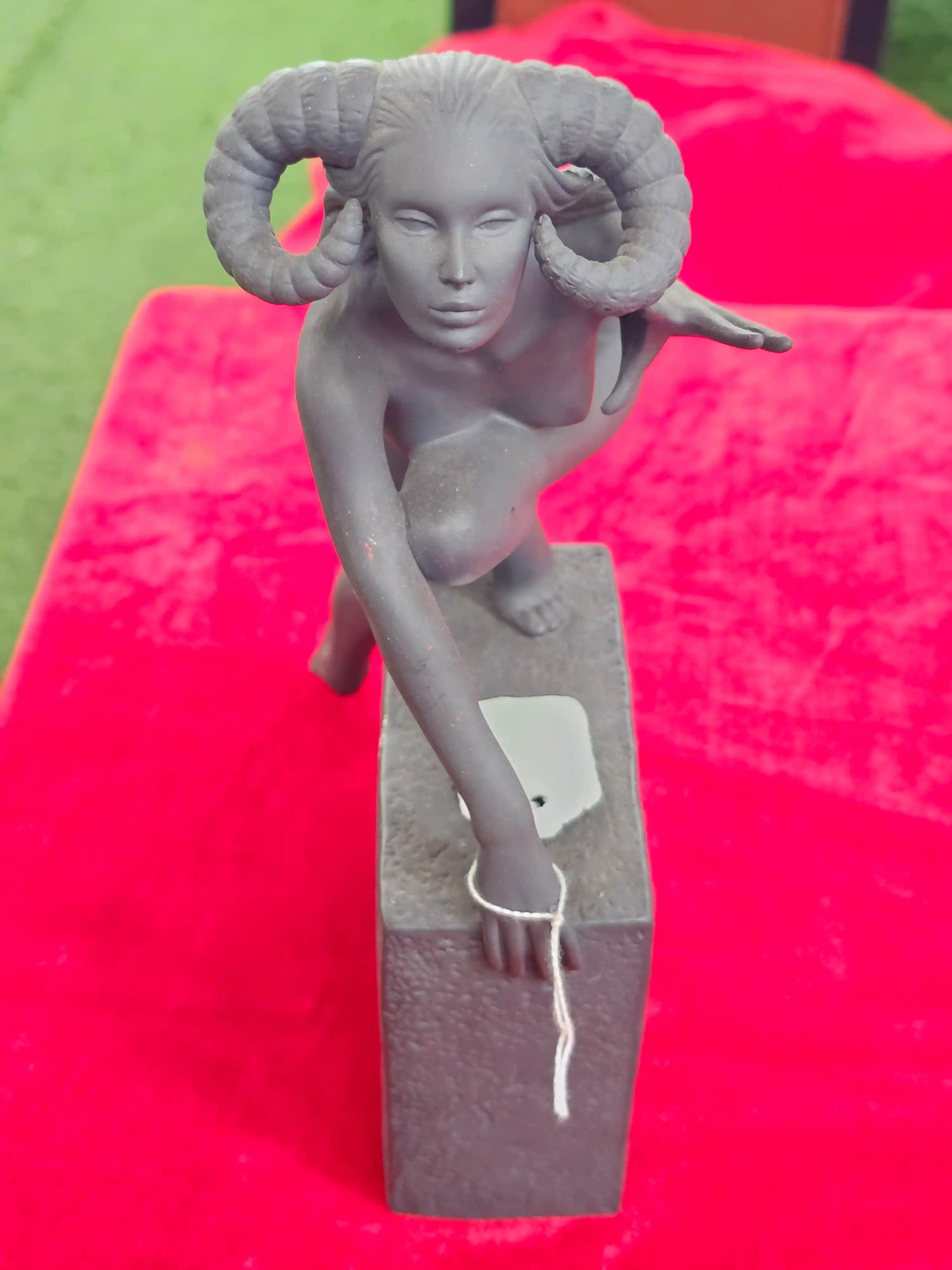 Ram-Horn Figure Sculpture